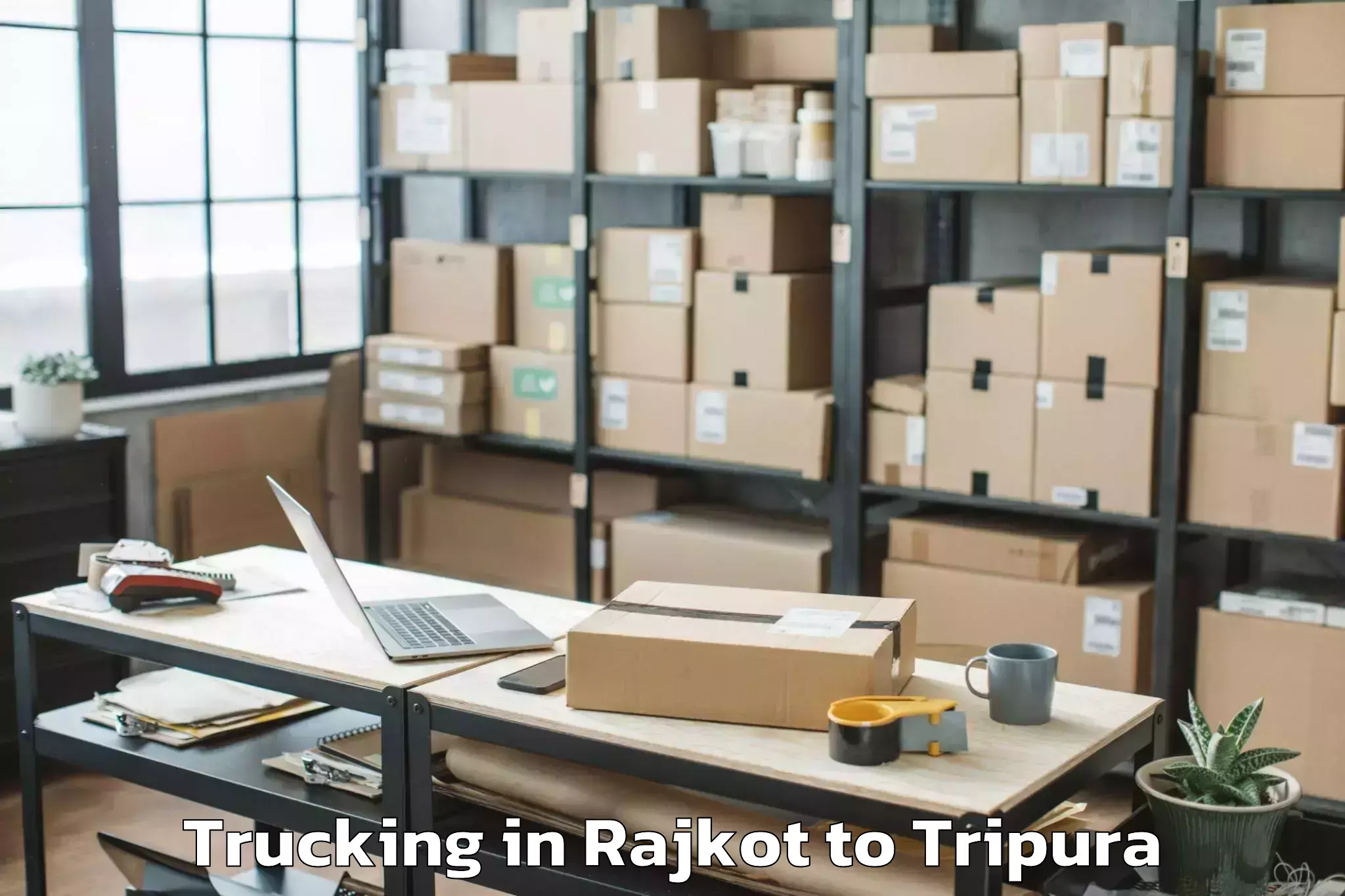 Affordable Rajkot to Jampuijala Trucking